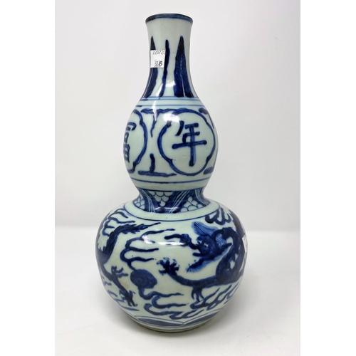 307b - A Chinese blue and white double gourd shaped with dragon decoration, ht 30cm