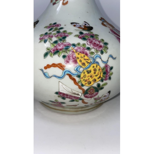 327 - A Chinese bottle vase decorated in polychrome with figures, flowers etc, ht 34cm