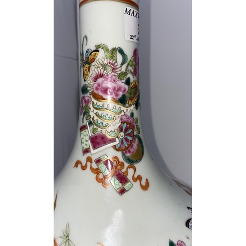 327 - A Chinese bottle vase decorated in polychrome with figures, flowers etc, ht 34cm