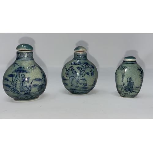 329 - Three Chinese snuff bottles, Guangzhou design decorated with figures and animals in landscapes again... 