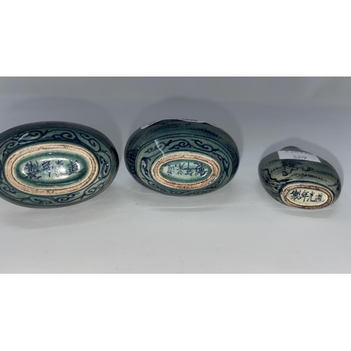 329 - Three Chinese snuff bottles, Guangzhou design decorated with figures and animals in landscapes again... 