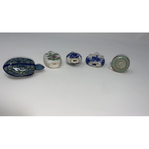 330 - A Chinese small blue and white moon vase; 4 other snuff bottles