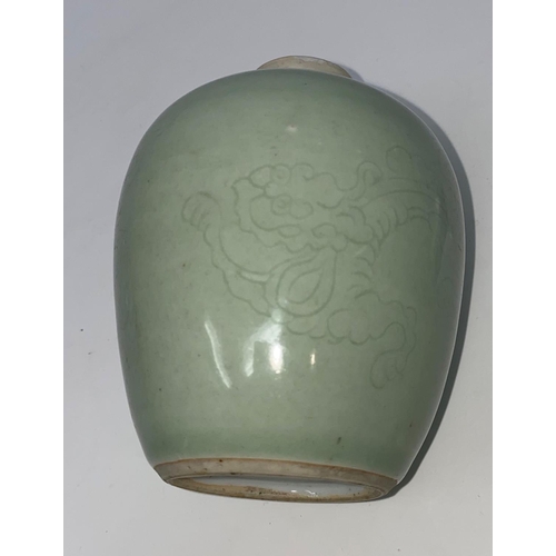 357 - A Chinese ginger jar with celadon glaze and incised dragon decoration, 10 cm (no lid)