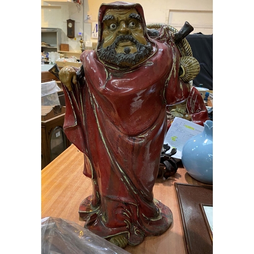 359c - A large Chinese figure of a man (restored), ht 47cm