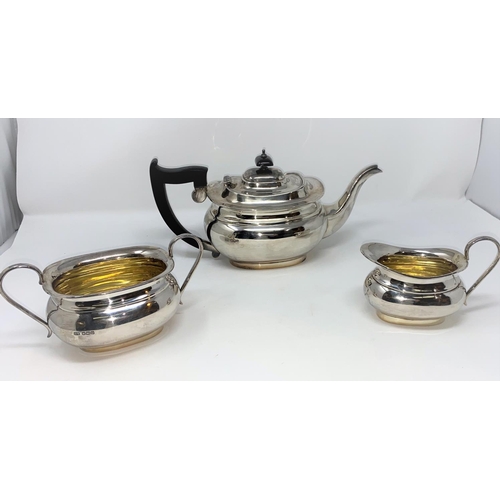 432 - A Georgian style rounded rectangular 3 piece hallmarked silver tea set 38oz, Sheffield 1930