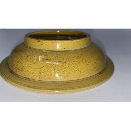 363a - A Chinese yellow glaze dish with exterior  dragon motif, mark to base, 13.5cm