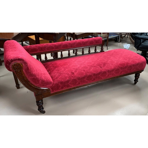 622 - An Edwardian mahogany chaise longue with scroll end, in wine coloured dralon