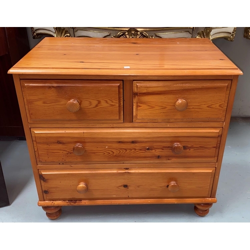 667 - A small pine chest, of 2 long, 2 short shelves and a pine stool