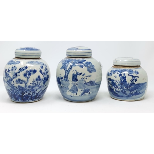 317 - A Chinese blue and white ginger jar depicting children picking fruit, another depicting blossom etc ... 