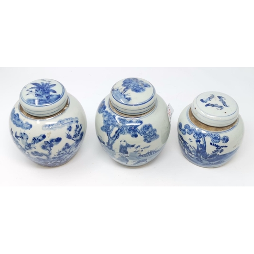 317 - A Chinese blue and white ginger jar depicting children picking fruit, another depicting blossom etc ... 