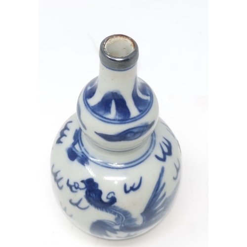 319 - A Chinese blue and white double gourd vase decorated with phoenix with white metal rim, 11.5cm