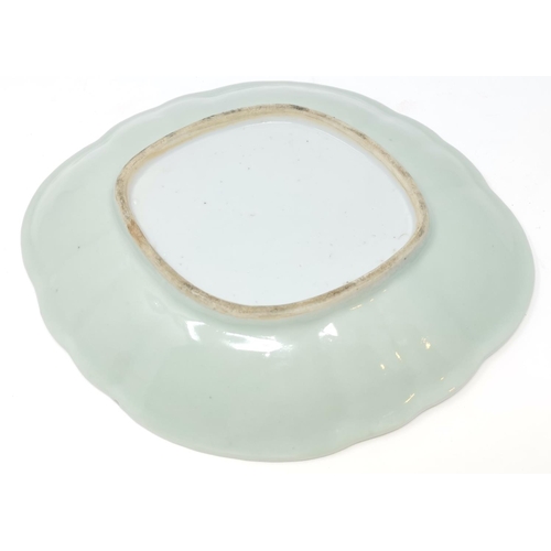 319B - A Chinese celadon glaze dish of oval form length 27cm