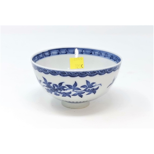 320C - A Chinese blue and white rice bowl decorated with pomegranates, with raised point on base diameter 1... 