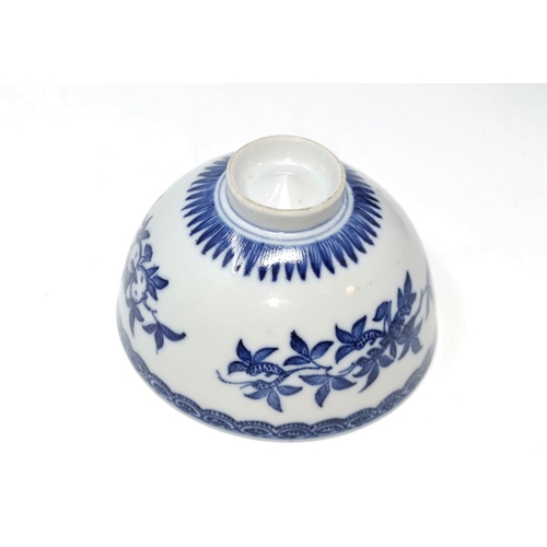 320C - A Chinese blue and white rice bowl decorated with pomegranates, with raised point on base diameter 1... 