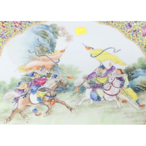 321C - A Chinese famille jaune wall plaque depicting central scene of warriors on horse back 34cm diameter