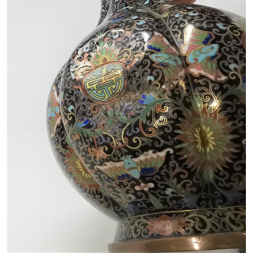 323A - A large Chinese cloisonne vase with raised section (some denting) height 34cm