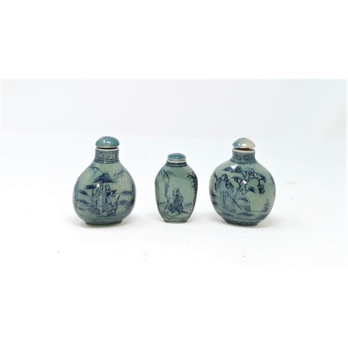 329 - Three Chinese snuff bottles, Guangzhou design decorated with figures and animals in landscapes again... 