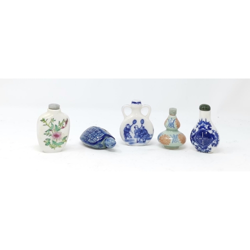 330 - A Chinese small blue and white moon vase; 4 other snuff bottles