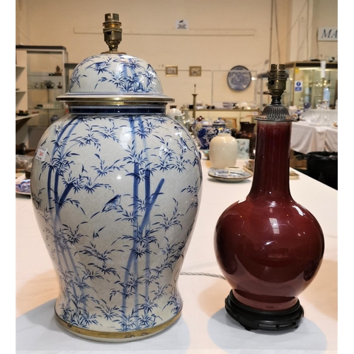 341 - A Chinese large covered baluster vase, crackle glaze decorated in blue and white with birds in bambo... 