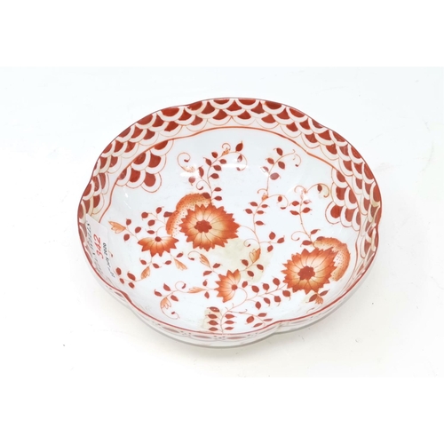 342 - A Chinese porcelain scalloped bowl decorated inside and out with flowers, fish scale border in bistr... 