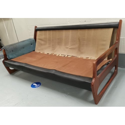 636 - A mid century teak G-Plan style settee with vinyl backing, length 174 cm