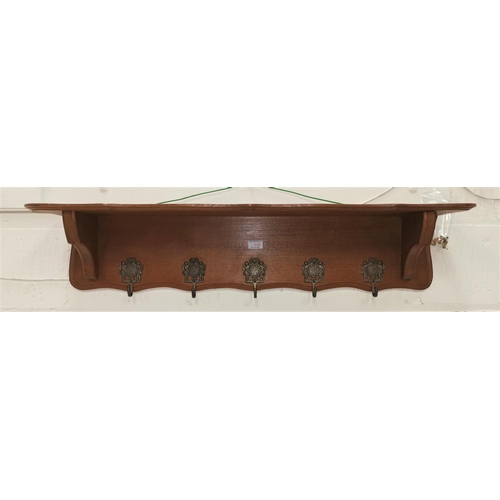 642 - An oak reproduction coat rack/wall shelf in the French style, 130 cm