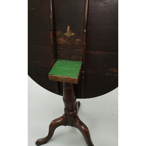 644 - A Georgian occasional table with circular top on turned column tripod base