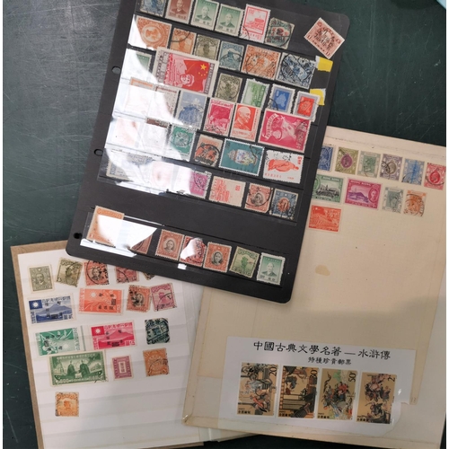 61 - A selection of Chinese stamps in albums and on sheets