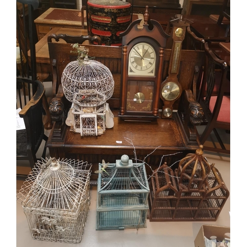 32 - 4 ornamental bird cages; a reproduction wall clock and barometer