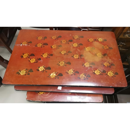 354a - An oriental nest of 3 occasional tables in red lacquer