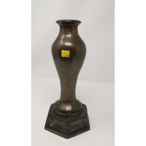 367B - A Chinese, possibly MING period bronze baluster vase attached to bronze stand. height 29 cm