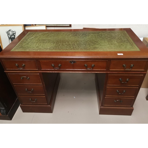 625 - A reproduction mahogany desk on twin pedestals, green leather effect top, 9 pedestal drawers
121cm l... 