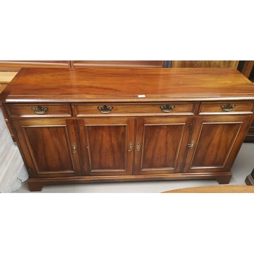 626 - A reproduction sideboard with 3 drawers over 3 cupboards, length 152 cm