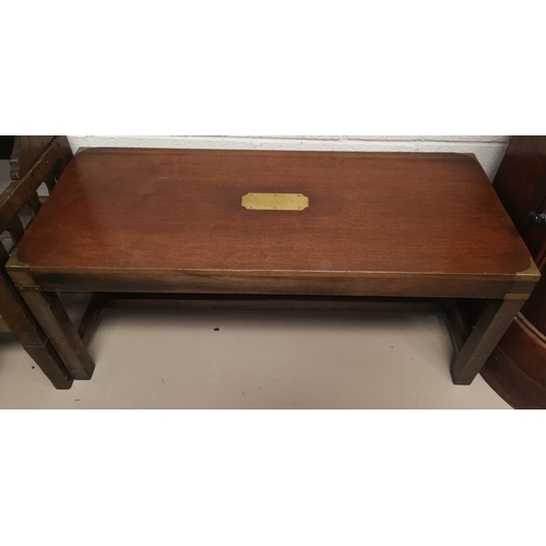 627a - A reproduction coffee table in the military style; a reproduction oak table; another