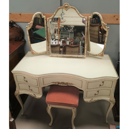 638 - A French style dressing table in cream, with triple mirror and stool