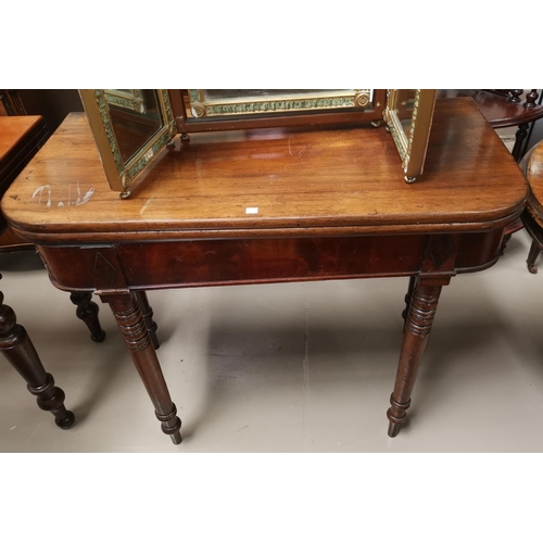 669 - An early 20th century fold over tea table