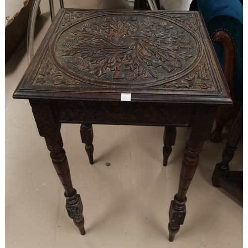 673 - A 19th century      occasional table with Macclesfield school carving