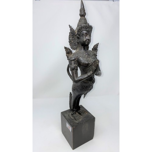 367 - A Thai bronze sculpture of a deity in praying position on wooden plinth  height 52cm