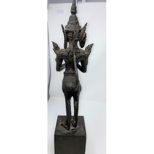 367 - A Thai bronze sculpture of a deity in praying position on wooden plinth  height 52cm