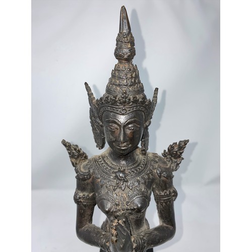 367 - A Thai bronze sculpture of a deity in praying position on wooden plinth  height 52cm