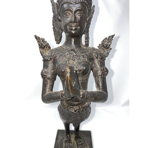 367 - A Thai bronze sculpture of a deity in praying position on wooden plinth  height 52cm