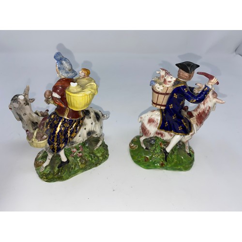 303A - An early 19th century pair of Derby style figure groups:  