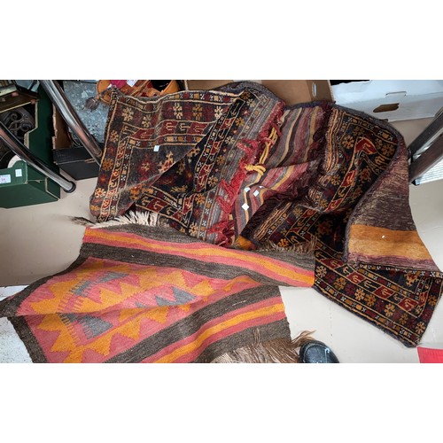 97 - A pair of Turkoman saddle bags and a small Kelim rug