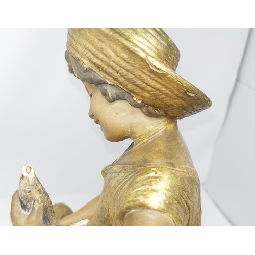 292 - A Goldscheider figure:  girl in sunhat holding a fish, impressed 'Goldscheider 191 G32, 9, signed 'C... 