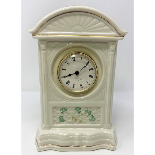 212 - A Belleek mantel clock, height 24 cm