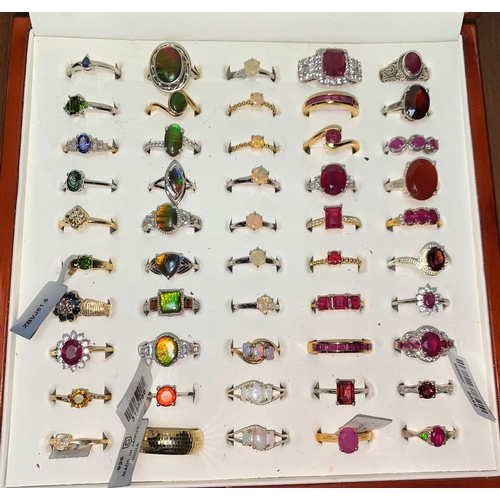 349 - Fifty white metal/plated decorative dress rings set coloured stones, mostly stamped '925'