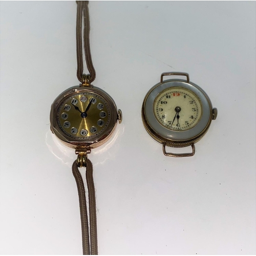 385 - A 1930's ladies 9 carat hallmarked gold wristwatch, octagonal shaped on brown strap (no glass); a si... 