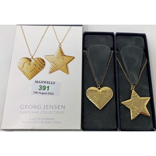 391 - Georg Jensen - an originally boxed set of 2 gold plated Christmas drops