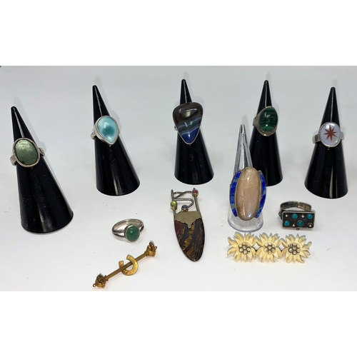 417 - A selection of white metal rings set with various stones