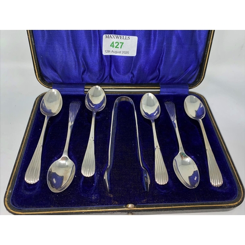 427 - A cased set of six hall marked silver old English pattern with reeded terminals coffee spoons and to... 